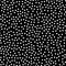 Random scattered polka dot pattern, abstract black and white background, white dots on black