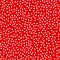 Random scattered polka dot pattern, abstract red and white background, white dots on red