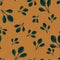 Random seamless doodle pattern with autumn simple leaf silhouettes. Brown ornament on orange background