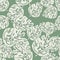 Random seamless flora tropic pattern with doodle monstera leaf shapes. Green pastel background