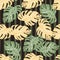 Random seamless pattern with orange and green colored monstera leaf. Dark striped background