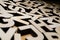 Random wooden block letters lying on wooden background