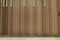 Random wooden strip wall in vertical direction / interior design decoration / background / copy space