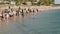 ranger talks to crowd about two dolphins at the daily feeding at monkey mia