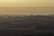 Ranges of Ramon Crater in the Negev Desert in the early morning in fog