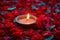 Rangoli elegance red rose floral design with a lit diya