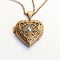 Rani-inspired Heart Locket In Gold With Green Gems