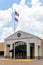 Rankin County Courthouse Annex building with the seal of the board of Supervisor and a Mississippi flag and USA Flag flying above