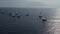 Ranks from yachts of participants of a regatta goes on a start point, is a sailing race at Croatia, reflection of sails