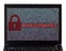 Ransomware text with red lock over encrypted text on a laptop sc