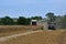 Rape Seed Oil Field Being Harvested