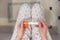 Rapid pregnancy test with negative result in woman`s hand sitting in bathroom