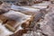 Rapids in a rock on a dam