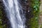 Rappelling down a waterfall