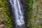 Rappelling down a waterfall