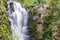 Rappelling down a waterfall