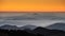 Rarau mountain , sunrise landscape in Romania with mist and mountains
