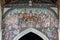 Rare 15th Century medieval church Doom painting above the chancel in St Thomas Becket church in Salisbury, Wiltshire, UK