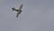 Rare biplane airplane in flight in grey bad weather conditions