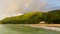 Rare double rainbows on a beach on the island of Mahe in Seychelles