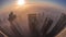 Rare early morning winter fog above the Dubai Marina skyline and skyscrapers lighted by street lights aerial night to