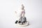 Rare porcelain figurines on a white background.