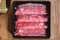 Rare slices authentic A5 Grade Japanese Wagyu beef with high-marbled texture for Shabu