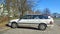 Rare vintage historic old rusty white car sedan Rover 220 GSi 16v parked