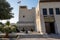 Ras al Khaimah Museum historical tourist location entrance, flag, and cannons on a sunny day