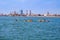 Ras Al Khaimah during sunny day . View to beautiful bay with harbour with canoeists in background