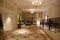 RAS AL KHAIMAH, UNITED ARAB EMIRATES - JUN 13, 2019: Spacious carpeted corridors in an opulent luxury hotel in the