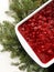 Rasberry pretzel delight with pine leaves on white background