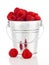 Raspberries berries in a metal bucket,