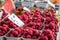 Raspberries on a farm market in the city. Fruits and vegetables at a farmers market