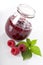 Raspberries and jar with jam