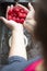 Raspberries washing under the sink female hands.