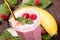 Raspberry banana smoothie closeup