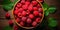 Raspberry banner. Bowl full of raspberries. Close-up food photography background