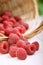 Raspberry in a basket on the table