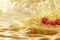 Raspberry berries in golden maple syrup on light bokeh background, space for copy