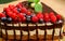 Raspberry cake and many fresh raspberries ,Forest wild berry fruits Muss cake with chocolate an white chocolate