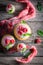 Raspberry cupcake made of pink cream and fresh fruits