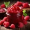 Raspberry Delights: Jar of Homemade Jam Surrounded by Nature\\\'s Juicy Gems