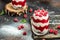 Raspberry dessert cheesecake, trifle, mouse in a glass. Raspberry Greek yogurt granola parfait on a dark background. Restaurant
