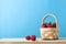 Raspberry Fruit Basket on Blue Background