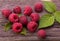 Raspberry fruit on wood