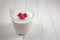 Raspberry in a glass of yogurt