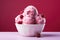 Raspberry ice cream in a bowl
