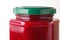 Raspberry jam in hexagonal jar