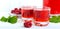 Raspberry liqueur in glass and fresh berries on a white background. Alcoholic flavored drink. Banner